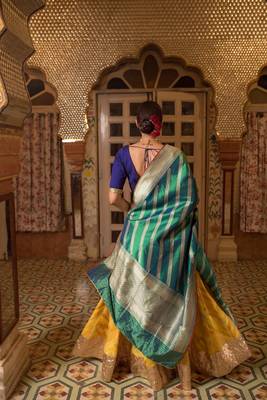 Upcycled patchwork lehenga in shades of yellow made with remnants of heritage fabrics like silks, cottons, prints. 4