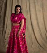 Upcycled patchwork lehanga in shades of pink with hand made gota border paired with pink silk blouse and chanderi.