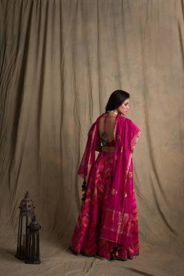 Upcycled patchwork lehanga in shades of pink with hand made gota border paired with pink silk blouse and chanderi. 4
