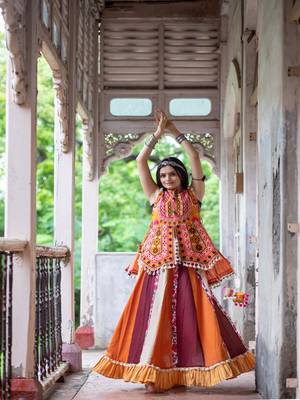 Eye catchy organge embroidered peplum style top with colorfull flairy skirt 3