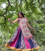 Off white temple embroidered panel with flairy colorfull skirt