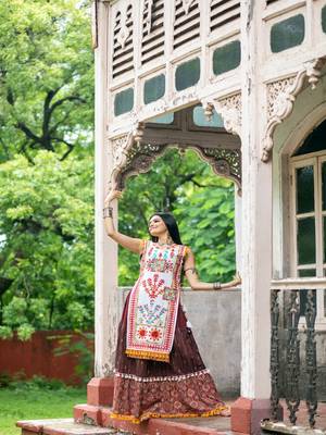 Off white dhingli motif embroidered panel top paired with wine trendy printed skirt 1