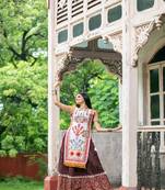 Off white dhingli motif embroidered panel top paired with wine trendy printed skirt