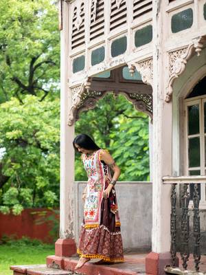 Off white dhingli motif embroidered panel top paired with wine trendy printed skirt 3