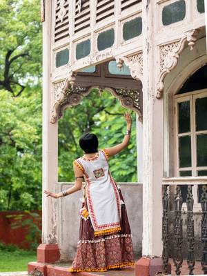 Off white dhingli motif embroidered panel top paired with wine trendy printed skirt 4