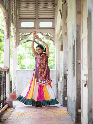 Deep green elephant motif treditional embroidered panel top with colorfull flairy skirt 2