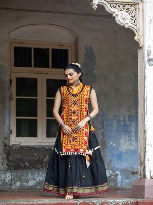Mustured yellow treditional embroidered panel top with black daman flairy skirt 1