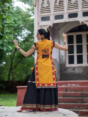 Mustured yellow treditional embroidered panel top with black daman flairy skirt 4