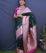Green woven Banarasi silk blend saree with blouse