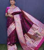 Maroon woven Banarasi silk blend saree with blouse