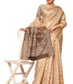 Beige woven organza saree with blouse