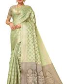 Light green woven organza saree with blouse