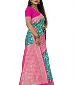 Teal woven banarasi saree with blouse