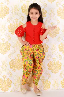 Twisha Girls printed top with potli button details and  printed Dhoti-Red And Yellow