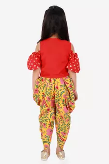 Twisha Girls printed top with potli button details and  printed Dhoti-Red And Yellow