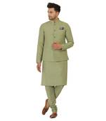 Nehru jacket in cotton silk base. It is paired with a matching kurta and a churidar pyjama.