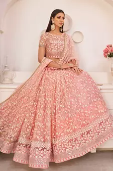 Peach embroidered net semi stitched lehenga