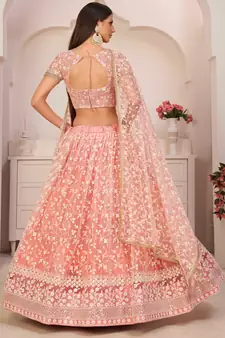 Peach embroidered net semi stitched lehenga