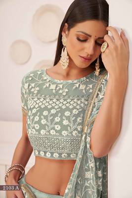 Green embroidered net semi stitched lehenga 3