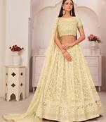 Light-lemon embroidered net semi stitched lehenga