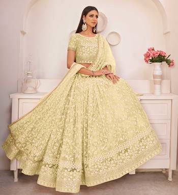 Light-lemon embroidered net semi stitched lehenga 2