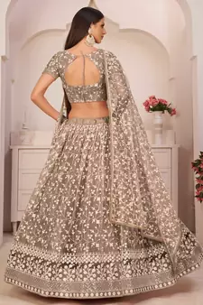 Brown embroidered net semi stitched lehenga