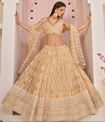 Beige embroidered net semi stitched lehenga 2