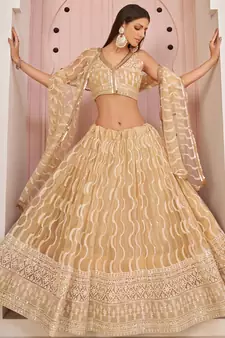 Beige embroidered net semi stitched lehenga