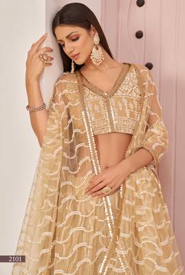 Beige embroidered net semi stitched lehenga 3