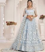 Turquoise embroidered net semi stitched lehenga
