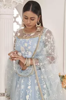 Turquoise embroidered net semi stitched lehenga