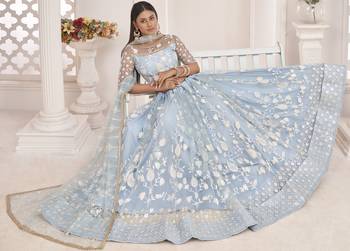 Turquoise embroidered net semi stitched lehenga 4