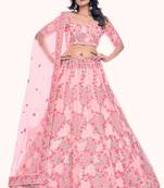 PEACH THREAD AND SEQUINS EMBROIDERED SOFT NET FESTIVE & PARTY WEAR SEMI STITCHED LEHENGA