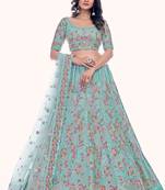 TURQUOISE THREAD AND SEQUINS EMBROIDERED SOFT NET FESTIVE & PARTY WEAR SEMI STITCHED LEHENGA
