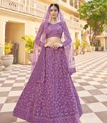 Pink embroidered net semi stitched lehenga