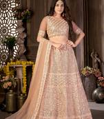 Peach sequins net semi stitched lehenga
