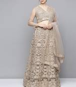 Beige sequins net semi stitched lehenga