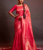 Pink woven Banarasi silk blend saree with blouse