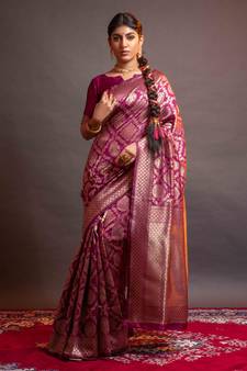 Magenta woven Banarasi silk blend Saree with blouse