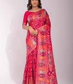Rani pink woven Banarasi silk blend saree with blouse