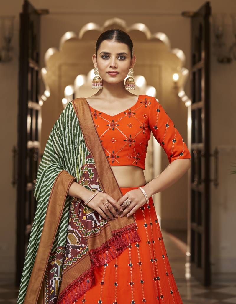 ORANGE THREAD AND SEQUINS EMBROIDERED GEORGETTE FESTIVE & PARTY WEAR SEMI STITCHED LEHENGA