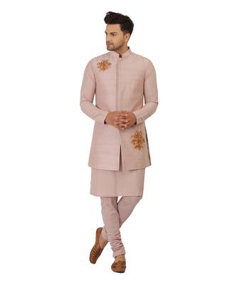 Featuring Acrylic motif indowestern in powder pink with kurta and churidaar. 1