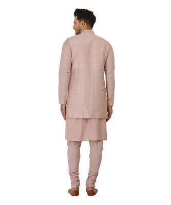 Featuring Acrylic motif indowestern in powder pink with kurta and churidaar. 2