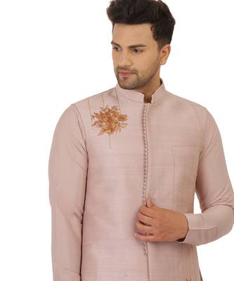 Featuring Acrylic motif indowestern in powder pink with kurta and churidaar. 4
