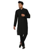 Featuring a black Quiled nehru jacket in art silk base. It is paired with a matching kurta and pants in ruby silk base.