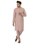 Featuring Powder pink Nehru Jacket with acrylic motif in art silk base. It is paired with kurta and churidaar.
