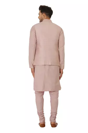 Featuring Powder pink Nehru Jacket with acrylic motif in art silk base. It is paired with kurta and churidaar.
