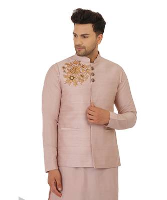 Featuring Powder pink Nehru Jacket with acrylic motif in art silk base. It is paired with kurta and churidaar. 4