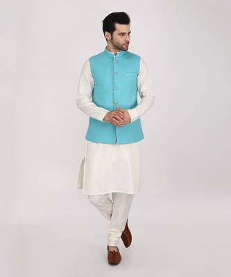Featuring Turquoise blue qulited nehru jacket with kurta & churidaar. 1
