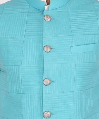 Featuring Turquoise blue qulited nehru jacket with kurta & churidaar. 4